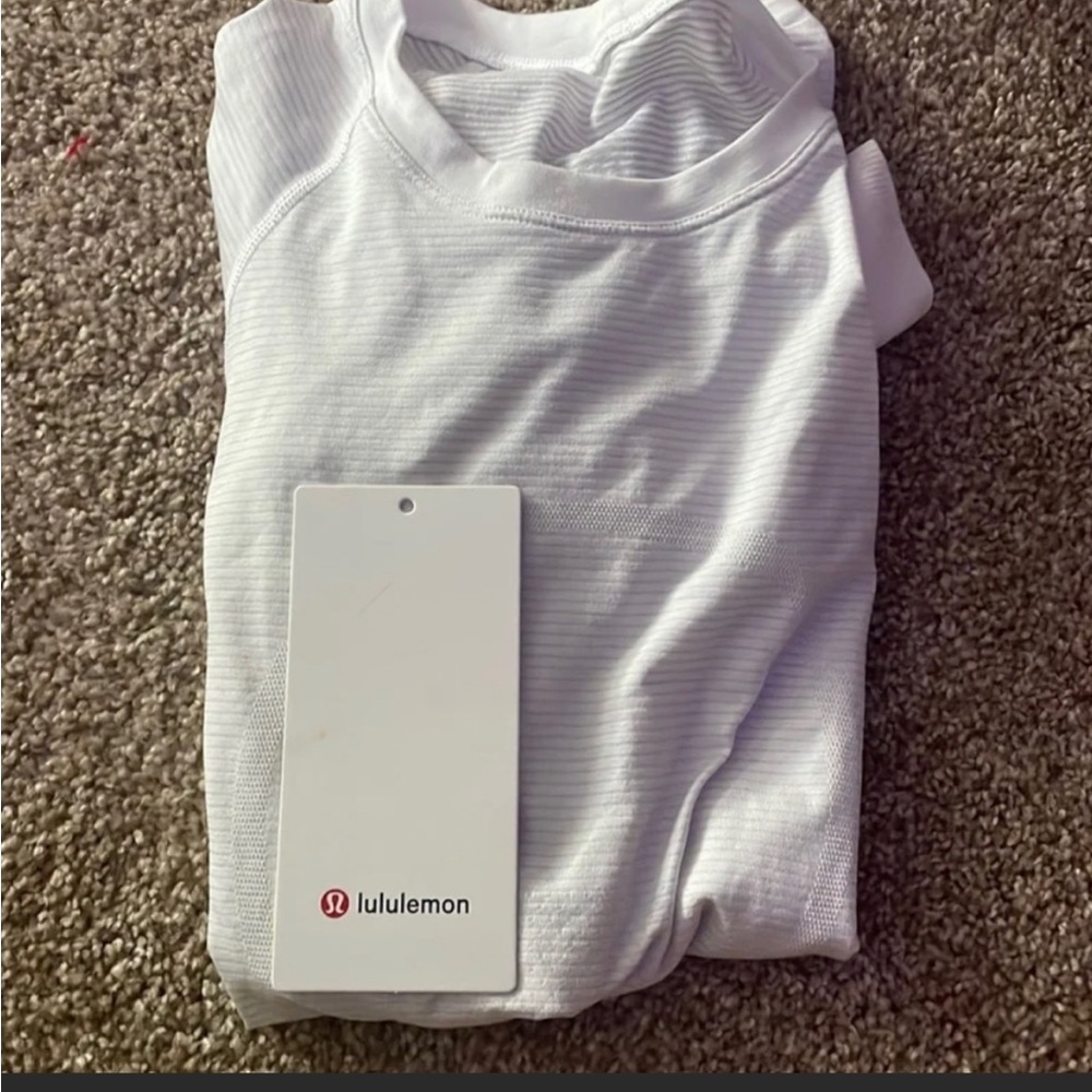Worn a couple times, Comes with tag (but not attached)